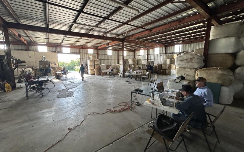 KEEN COMPETITORS, as always, these wool buyers have given themselves as much room as possible while in the bidding phase of the last wool auctions held at Bollman Industries’ warehouse in San Angelo. With the recent closings of wool warehouses in various states, the wool on hand for the May sales represented clips from across the country.